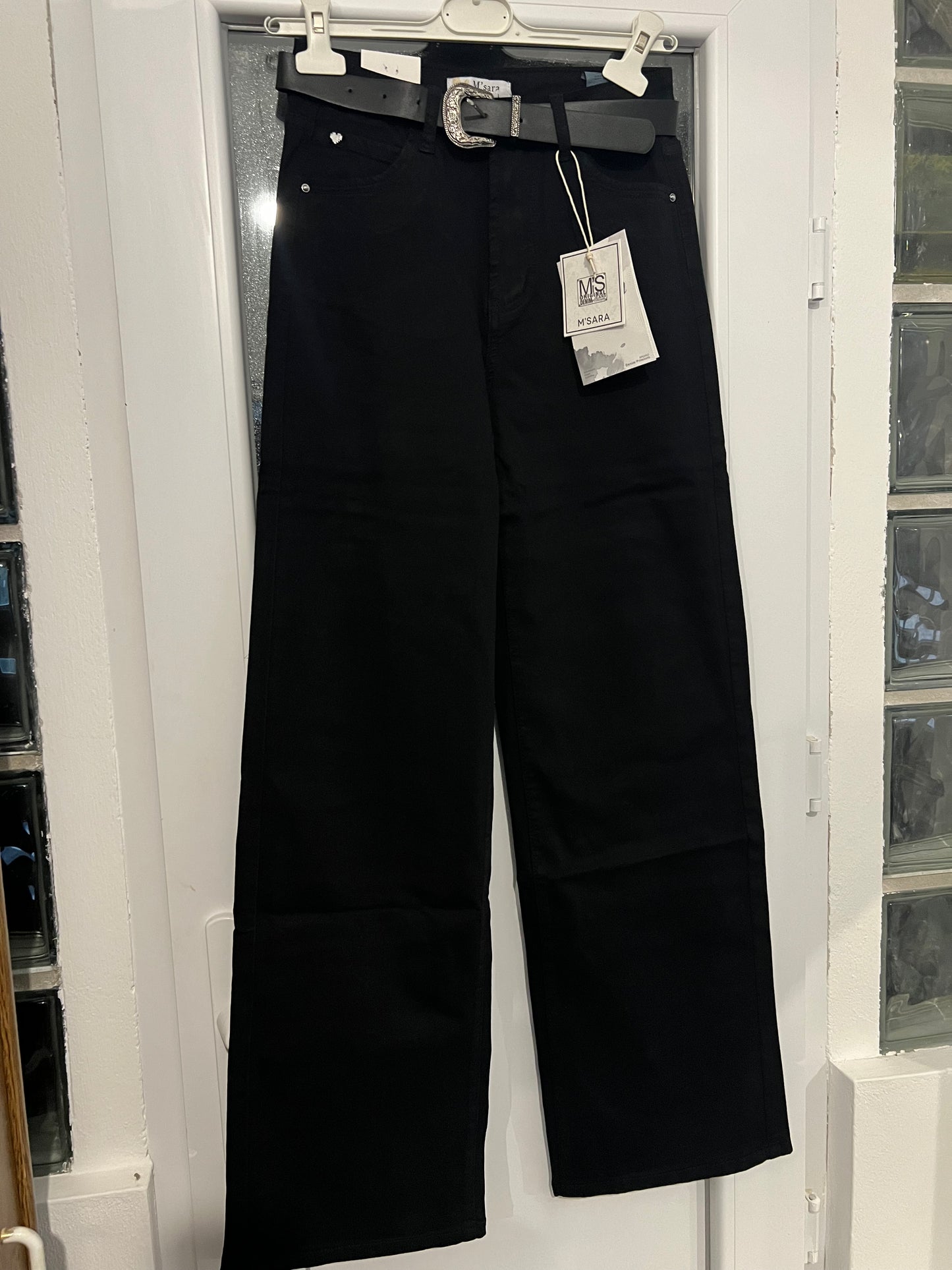 Crne traperice s remenom